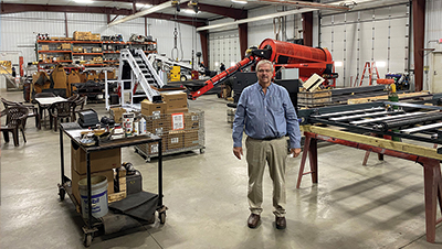 Harriston-Mayo Mike standing on his production floor