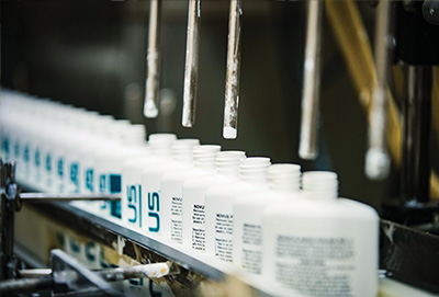 Bottles being filled at Seacole manufacturing. 