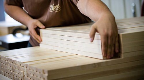 Finalizing a stack of finished lumber at Harris Hardwoods