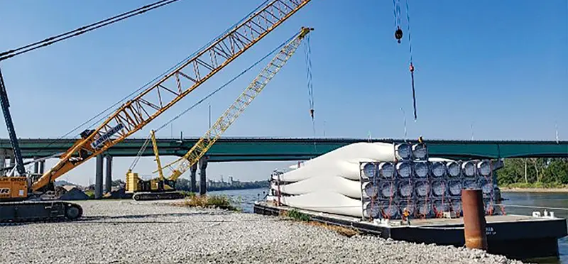 heavy crane and barge of wind turbine propellers