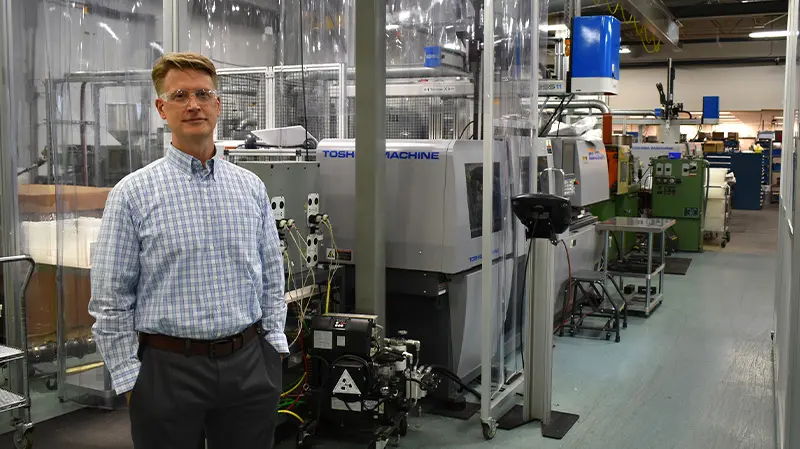 Savillex President Steve Hardining standing on the production floor