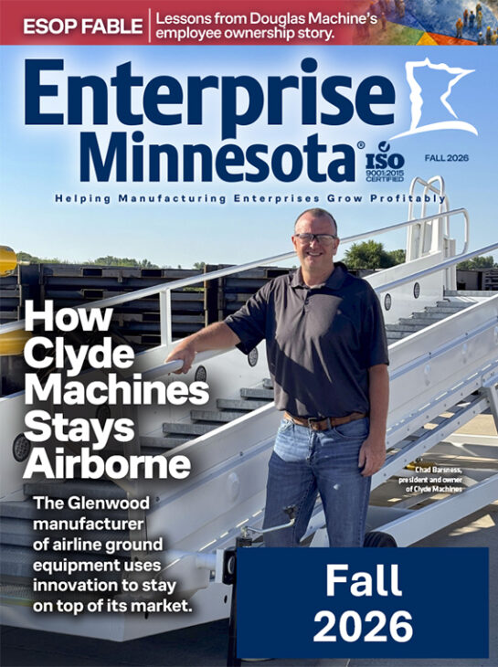 Cover of Enterprise Minnesota magazine, Fall 2026, showing Chad Barsness, president and owner of Clyde Machines, standing beside a large airline boarding stairway unit. Headline reads "How Clyde Machines Stays Airborne."